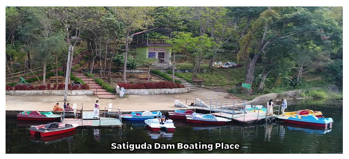 Boats and landscaped waterfront at Satiguda Dam Boating Place in Malkangiri